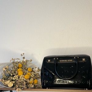 Black glossy Michael Kors hand bag